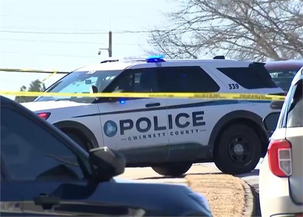 georgia hotel shooting leaves one officer dead  another seriously wounded