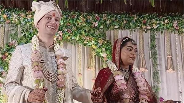 german boy decorates wedding in indian colors