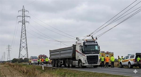 16 wheeler trailer collides with high tension wires