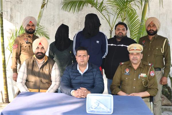 two arrested with weapons