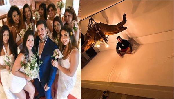 husband builds 20 foot bed for 6 wives