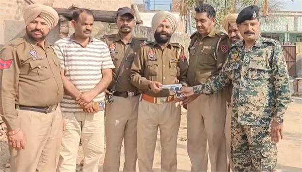 pistol recovered from packet dropped by drone in border school
