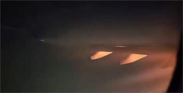 plane engine catches fire in mid air