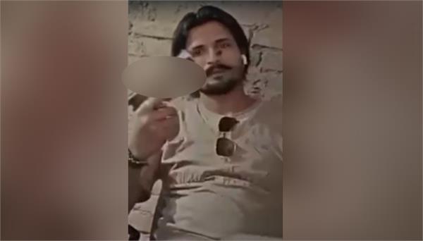 video of youth brandishing weapon in police station goes viral