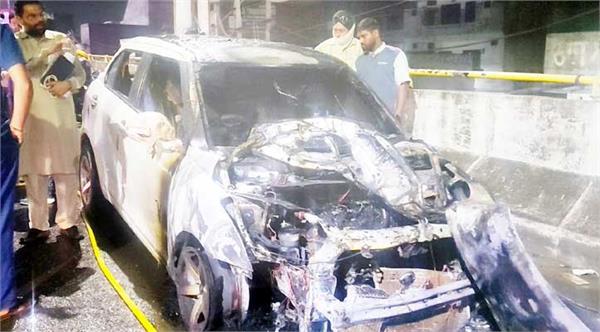 a car moving on a flyover caught fire