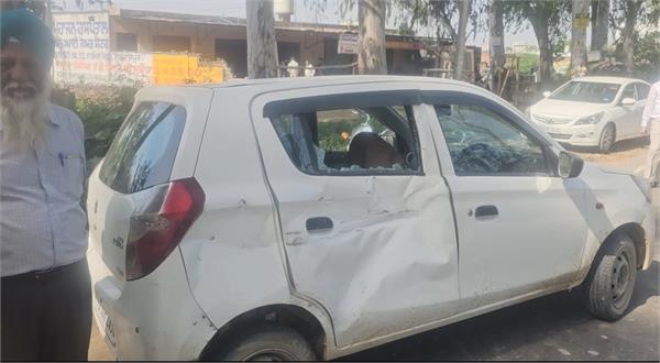 alto car badly damaged after being hit by an out of control tipper