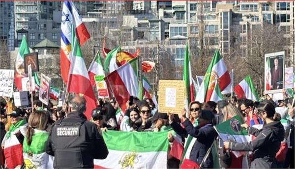 large gathering of iranians at david lam park in vancouver