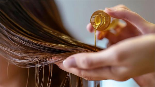 the correct way to apply oil to hair