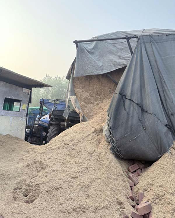 collision between tractor trolleys loaded with bricks  2 injured