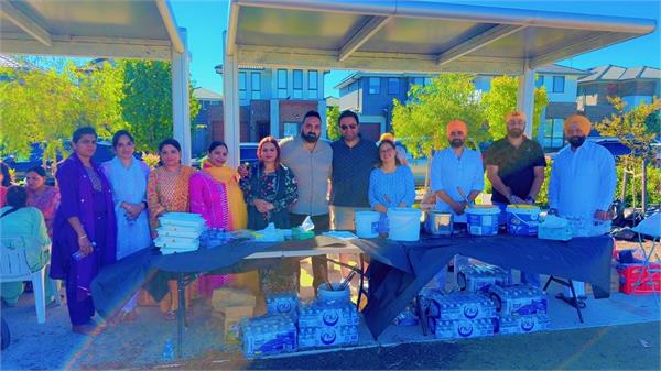 punjabi family hosts langar at malonba park on the holy day of vaisakhi