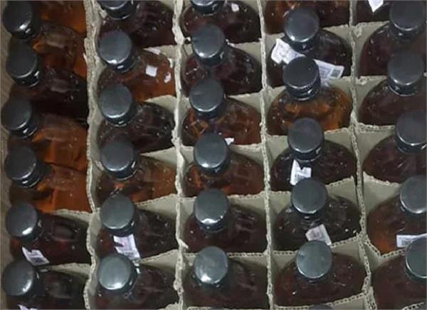 two persons arrested with 495 liters of illicit liquor