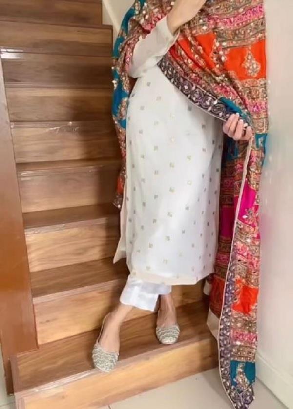 white suit  multi colored dupattas  young women  favorite