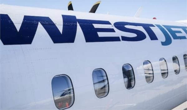 westjet implements temporary surcharge