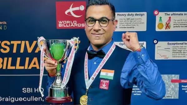 kothari defeats advani to retain world billiards title