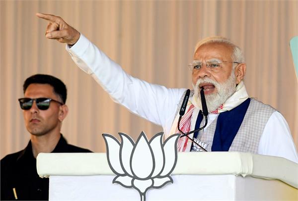 narendra modi  congress  pakistan  national security  assam  election rally