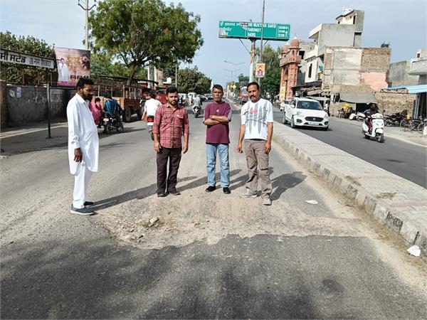 potholes in the road  taxi stand