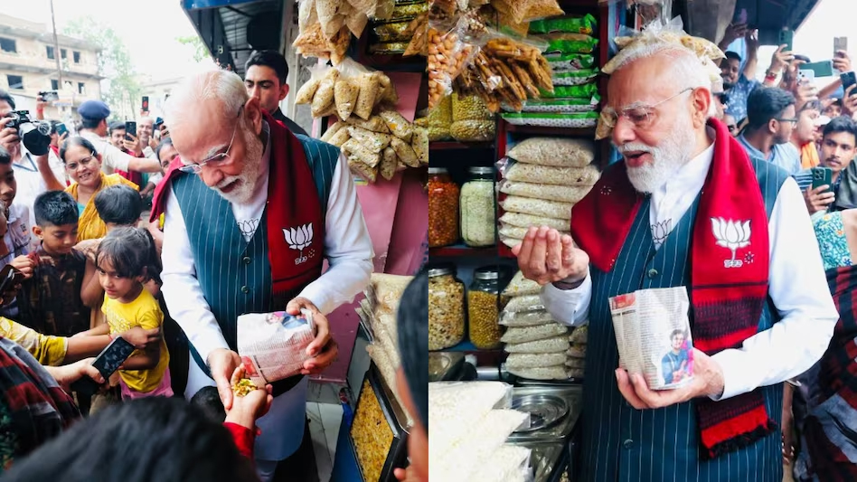"ਮੈਨੂੰ ਝਾਲਮੁੜੀ ਖਵਾਓ"..., ਦੇਸੀ ਅੰਦਾਜ਼ 'ਚ ਕਰਿਆਨੇ ਦੀ ਦੁਕਾਨ 'ਤੇ ਜਾ ਪੁੱਜੇ PM ਮੋਦੀ