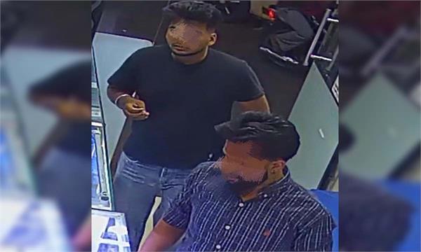 youth on motorcycle without number plate mobile phones