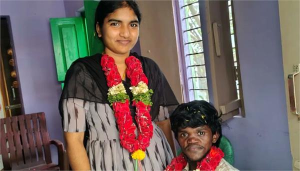 short statured groom of the beautiful bride