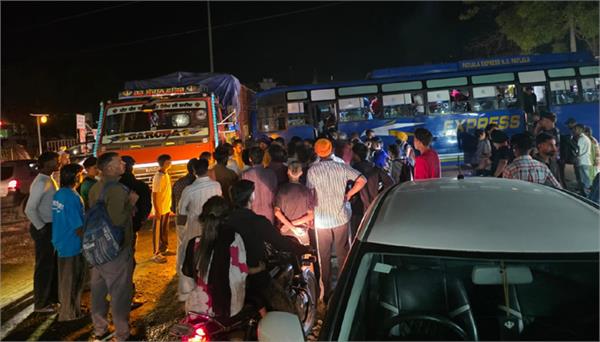 collision between a canter and a bus on national highway