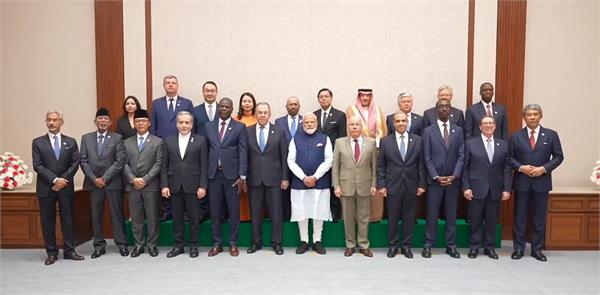 pm modi meets brics fms