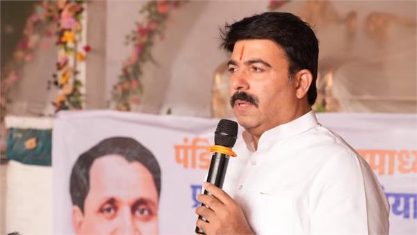 bjp mlas video goes viral for riding bike without helmet