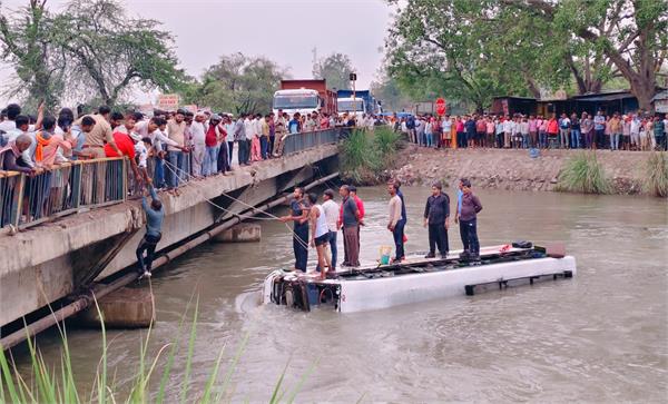 bus falls into canal