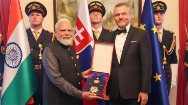 pm modi receives slovakia  s highest honor