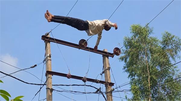 drunk man high tension wire drama  rescued police