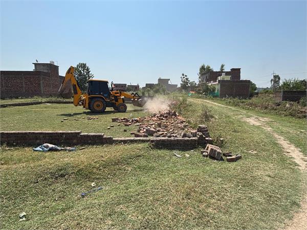 yellow claws on unauthorized colonies built in dinanagar