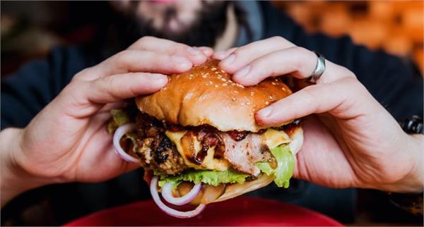 what is the correct way to eat a burger 