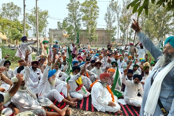 farmers upset over power cuts staged a protest in front of powercom office