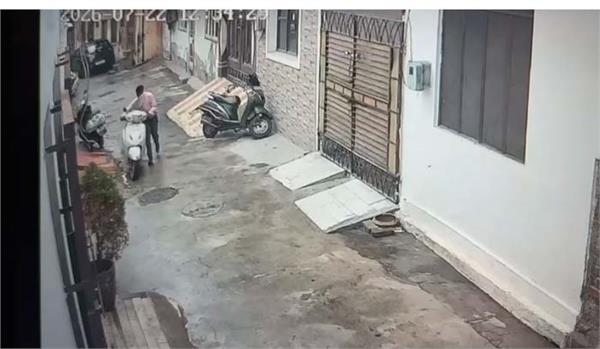 thief makes off with activa from outside the house  watch cctv footage