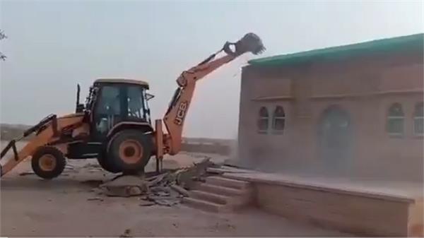 india pakistan border  mosques  government land  jcb