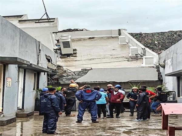 building  accident  people  rain