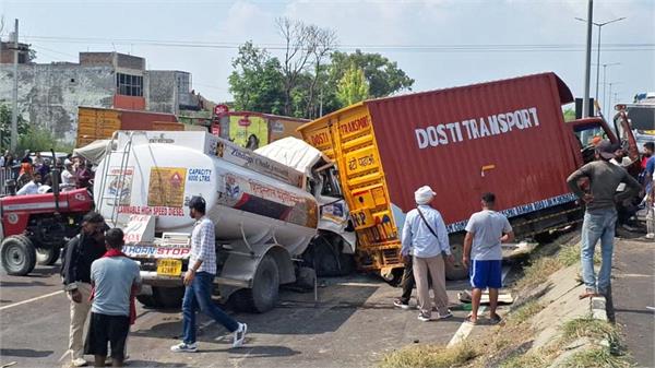 driver trapped in cabin after canters collide on national highway jalandhar