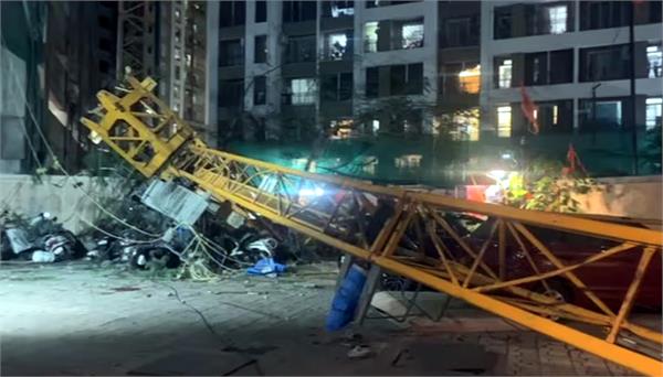crane falls from 13th floor of under construction building