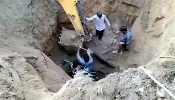uncle and nephew died after falling into a 30 foot deep pit