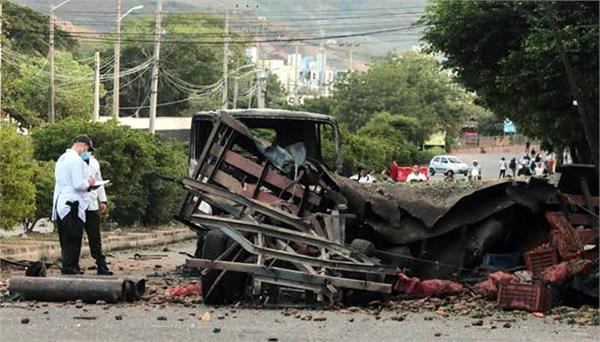 truck explodes outside police base in colombia