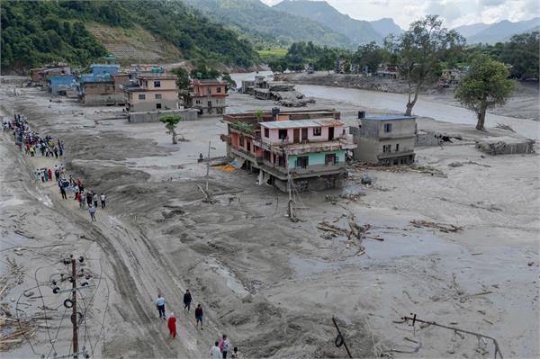 death toll from floods in nepal