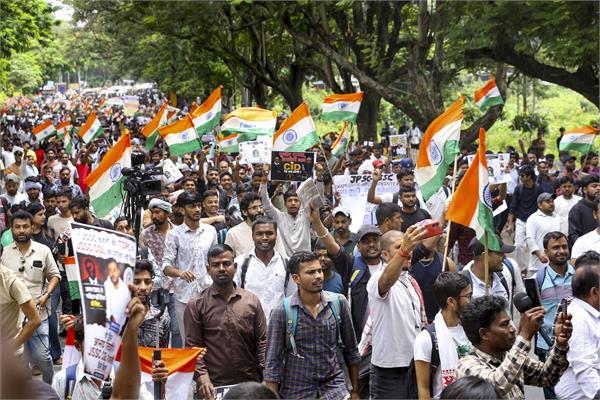 exam irregularities protest  bjp leaders  cm residence