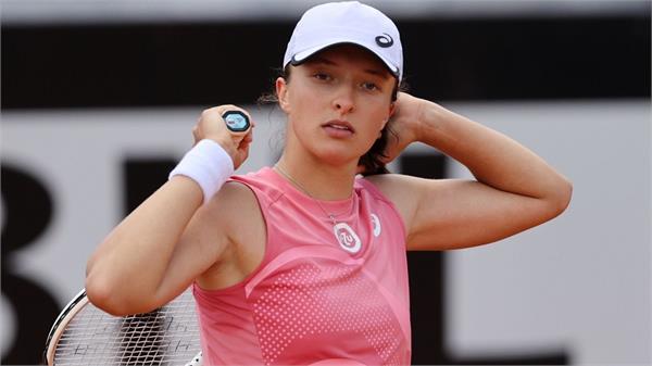 świątek defeats shnaider to reach semi finals