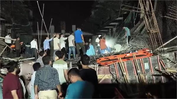 gujarat  part of a building under construction collapses in gandhinagar