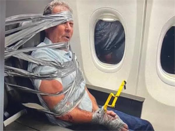 passenger taped up on us flight