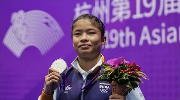 roshibina devi wins silver medal