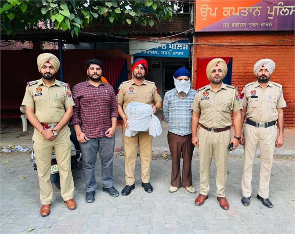 drug smuggler arrested with 14 kg opium and car