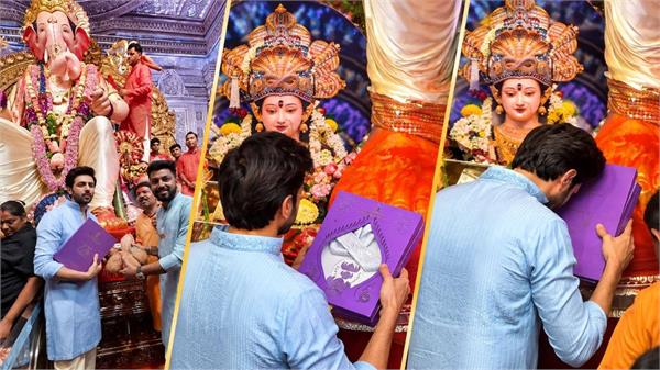 kartik aaryan visits lalbaugcha raja with national award