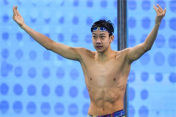 chinese swimmer zhang zhanshuo wins third gold medal with asian record