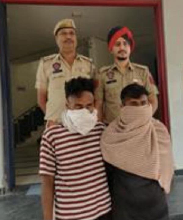 two accused arrested for snatching a woman  s gold earrings 